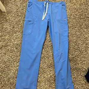 Figs scrub pants. I believe these are yola skinny. Large tall